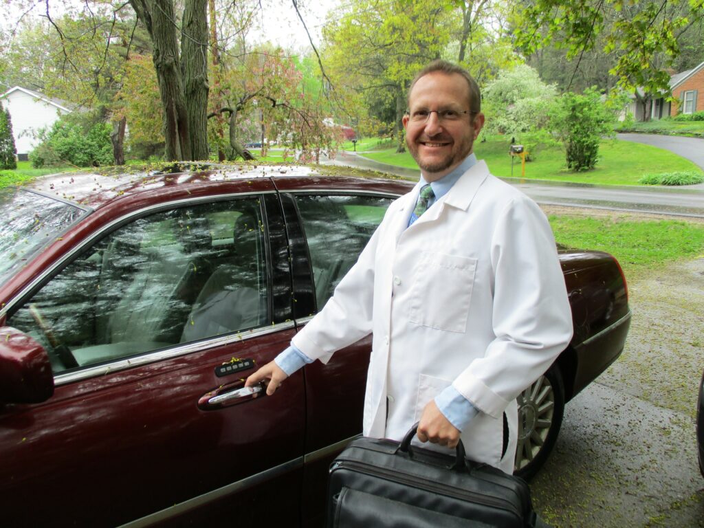 Vince Sadowski getting in his car for a service call